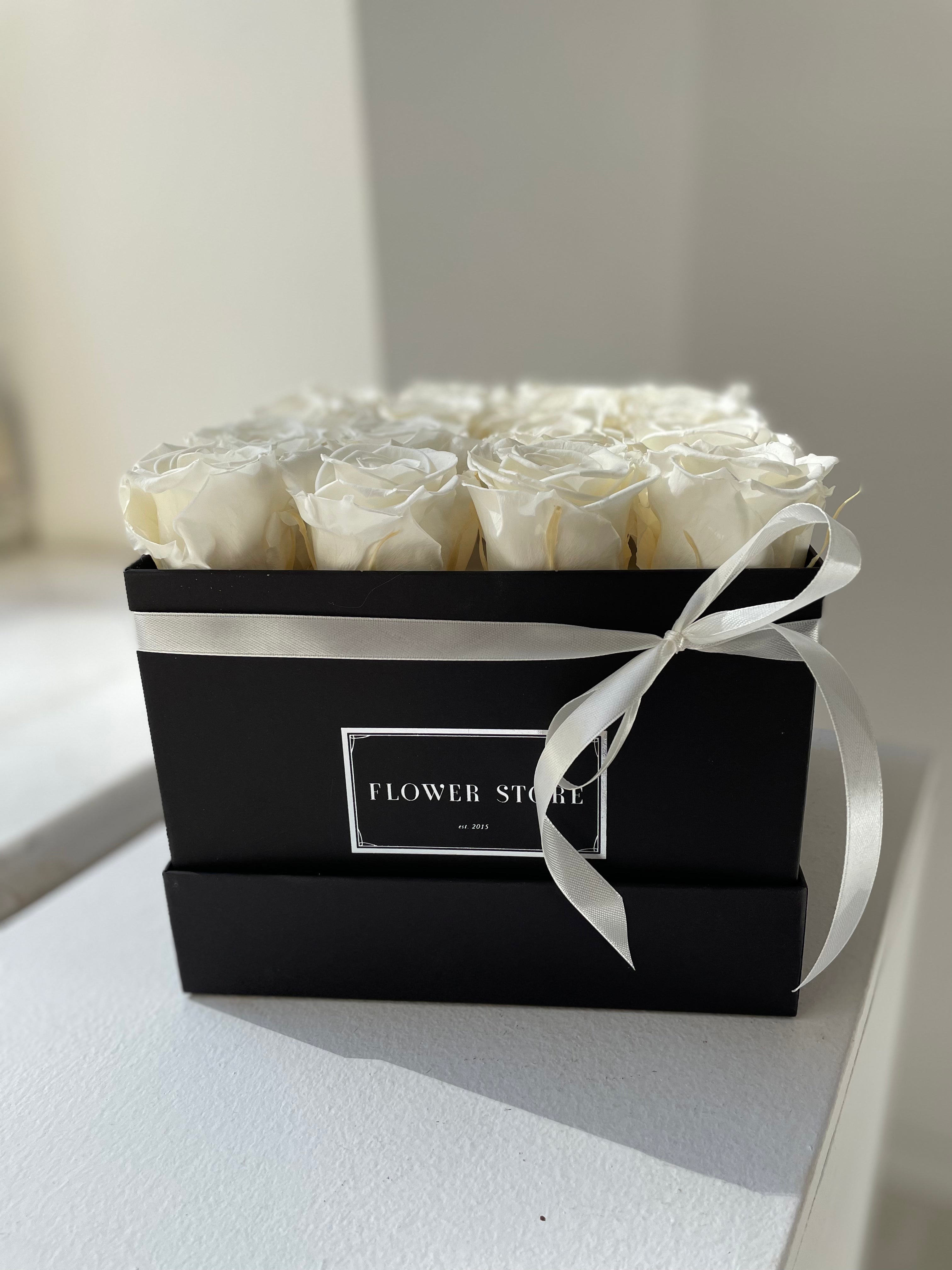 Square black box with white eternal roses